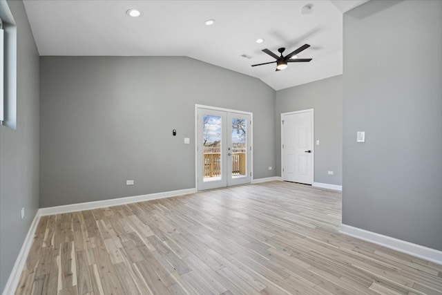 unfurnished room featuring ceiling fan, lofted ceiling, and light hardwood / wood-style floors