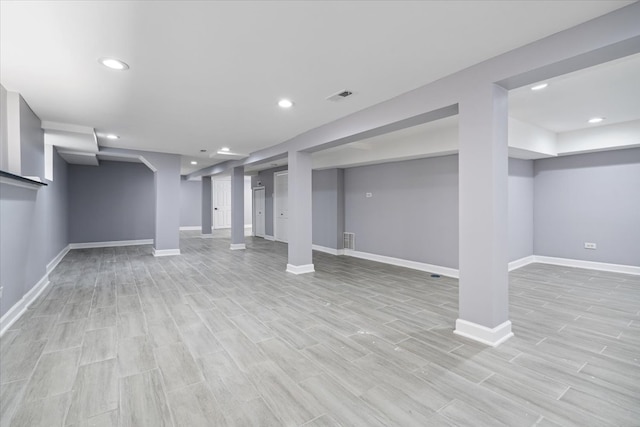 basement with light wood-type flooring