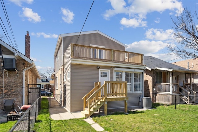 back of property featuring a yard and a balcony