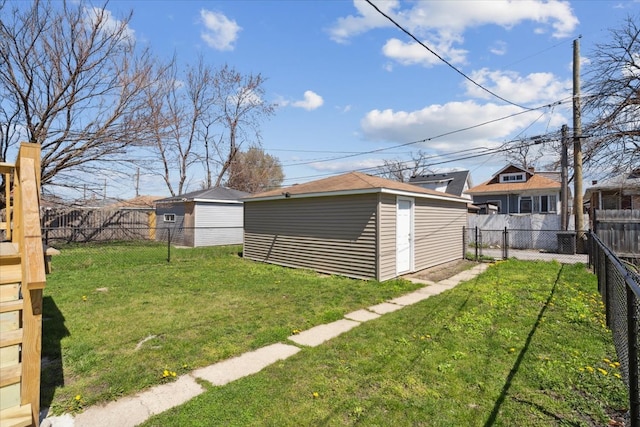 view of yard featuring a storage unit