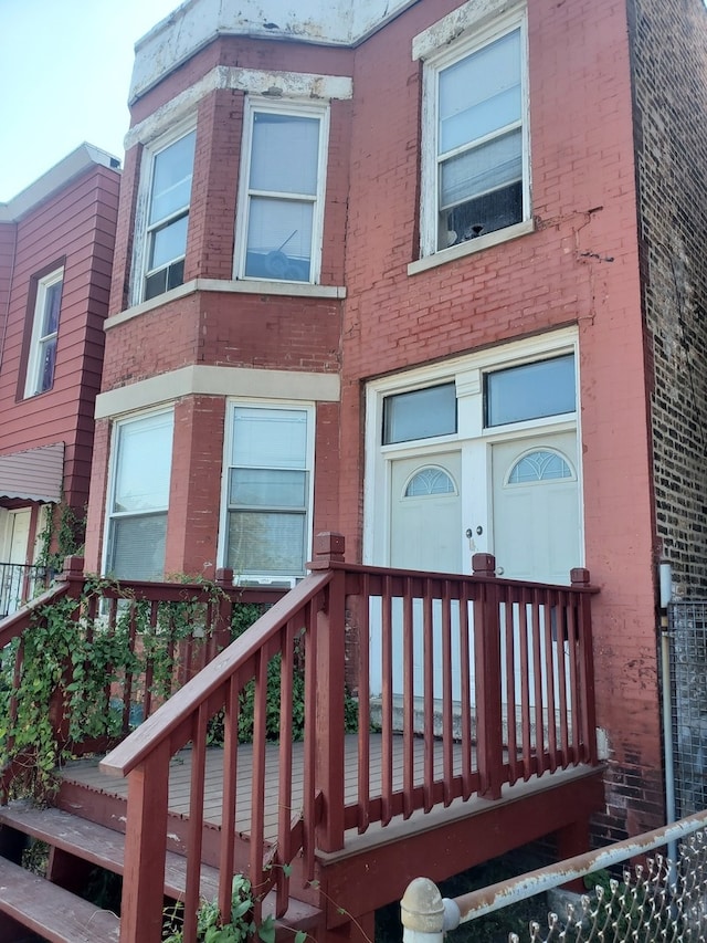 view of front of house with a deck