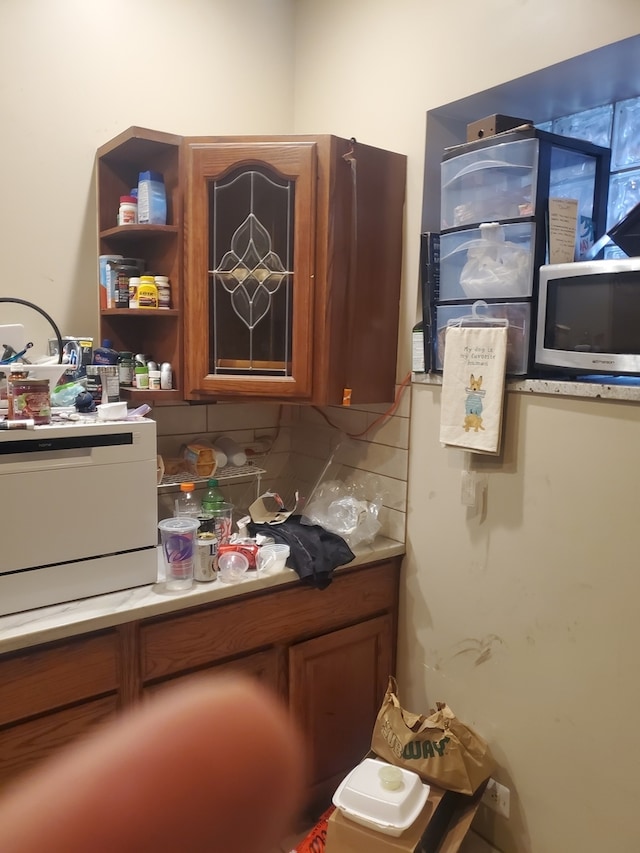 kitchen featuring tasteful backsplash