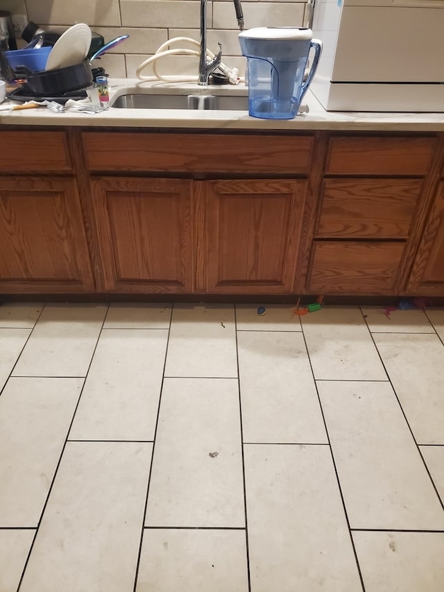 kitchen with light tile patterned floors