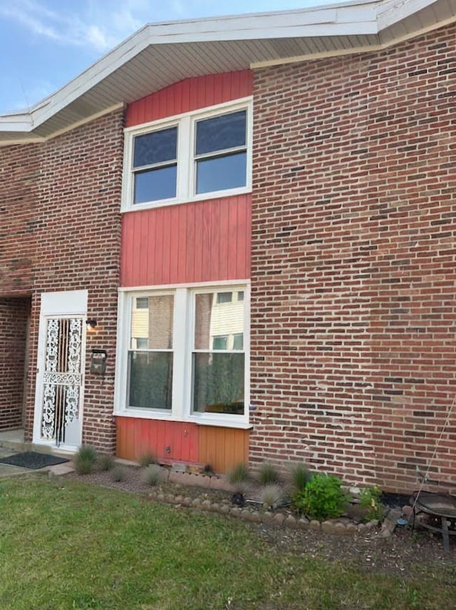 view of property exterior featuring a yard