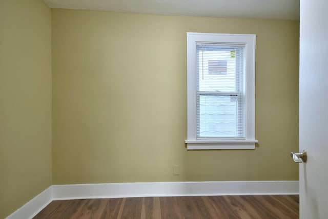 340 Pine St, Joliet, IL 60435 - empty room with baseboards and dark wood-style flooring