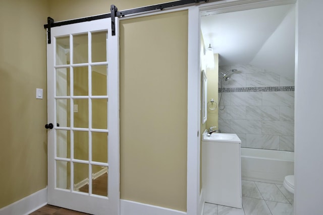 340 Pine St, Joliet, IL 60435 - bathroom with toilet, shower / bath combination, lofted ceiling, tile patterned floors, and a sink