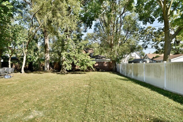 340 Pine St, Joliet, IL 60435 - view of yard featuring fence private yard