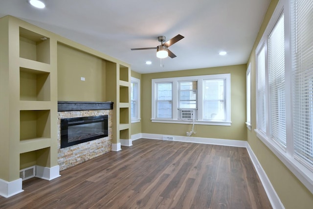 340 Pine St, Joliet, IL 60435 - unfurnished living room with visible vents, baseboards, a stone fireplace, and a ceiling fan