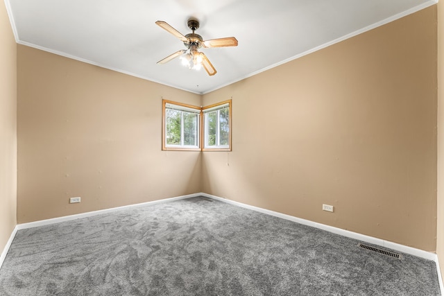 unfurnished room featuring ceiling fan, carpet flooring, and crown molding