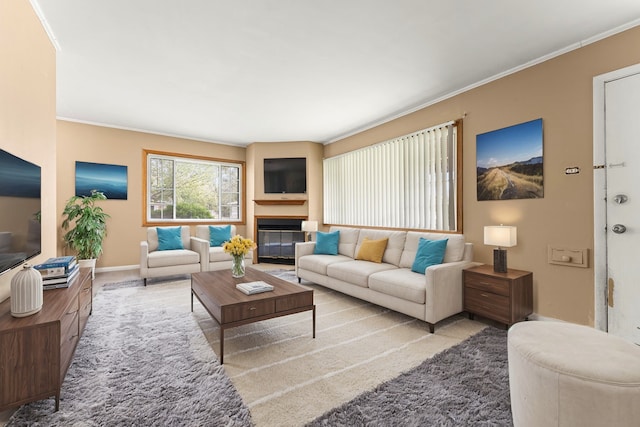 carpeted living room featuring crown molding