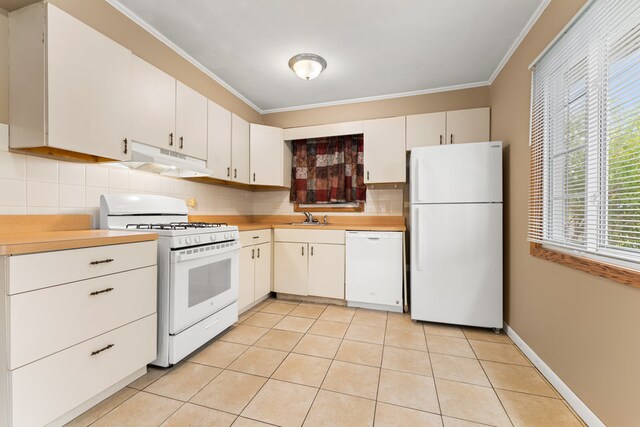 kitchen with white cabinetry, backsplash, white appliances, ornamental molding, and sink