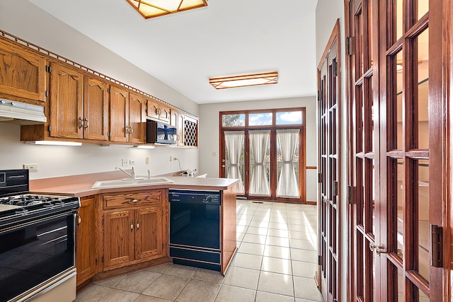 kitchen featuring black appliances, light tile patterned flooring, sink, and exhaust hood