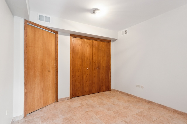 unfurnished bedroom featuring a closet