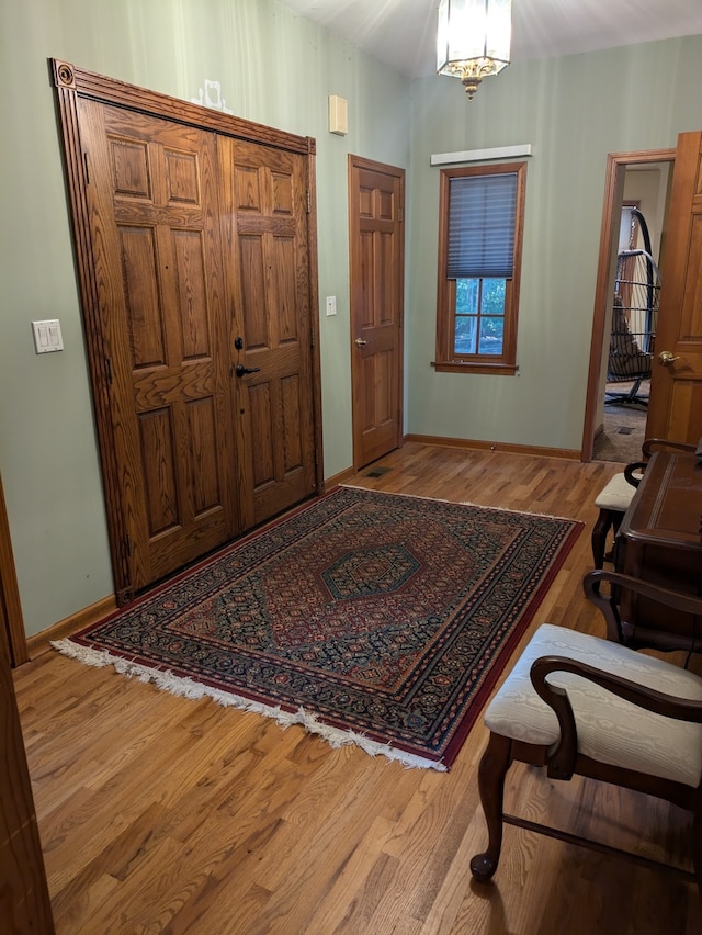 foyer with light hardwood / wood-style flooring