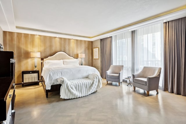 bedroom featuring light parquet floors