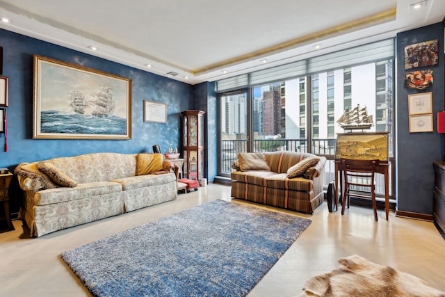 living room with a tray ceiling