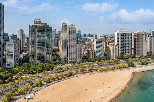 property's view of city with a beach view and a water view