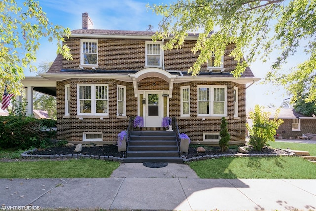 view of front of home with a front yard