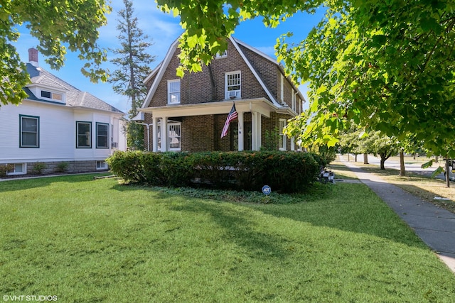 view of front of home with a front yard