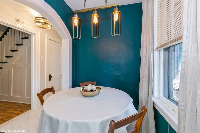 dining space featuring dark hardwood / wood-style floors