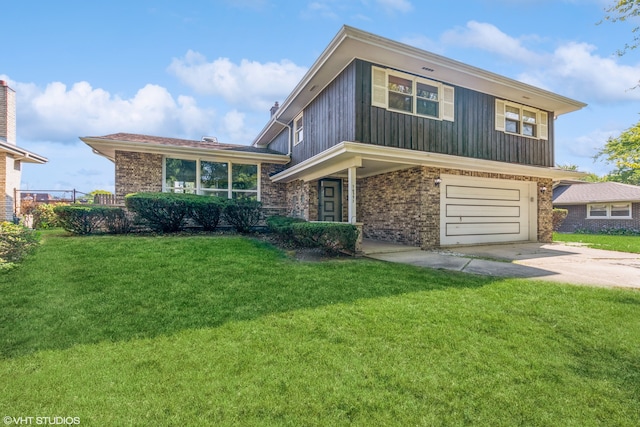 view of front of property with a front lawn and a garage