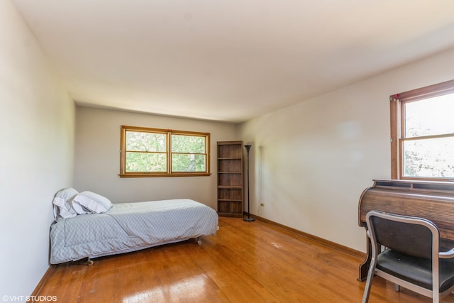 bedroom featuring light hardwood / wood-style floors