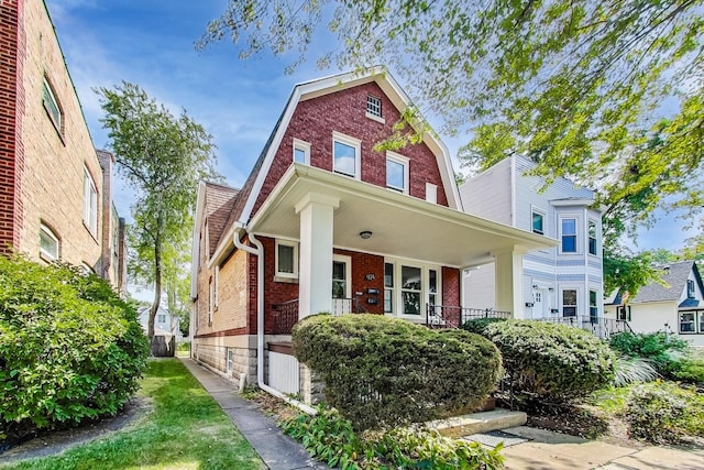 view of front of property with central AC unit and covered porch