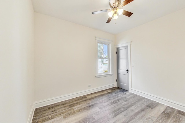 unfurnished room featuring ceiling fan and light hardwood / wood-style flooring