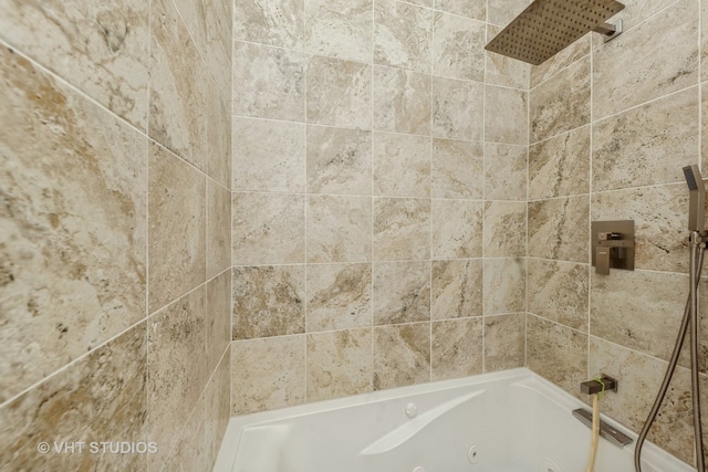 interior space with tiled shower / bath combo