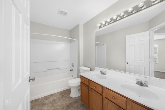 full bathroom featuring vanity, shower / bath combination, and toilet