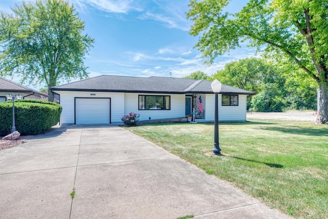 single story home with a front lawn and a garage