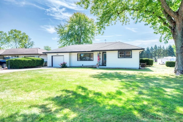 single story home with a front lawn and a garage