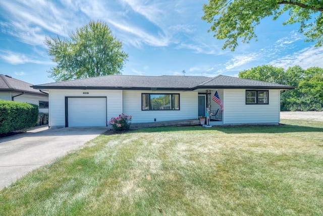 single story home with a front lawn and a garage