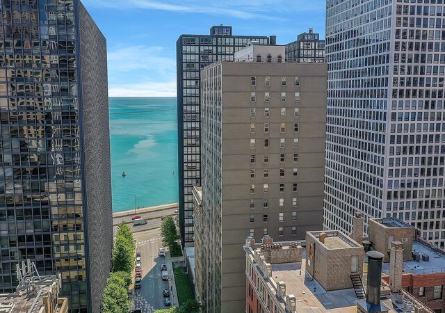 property's view of city with a water view