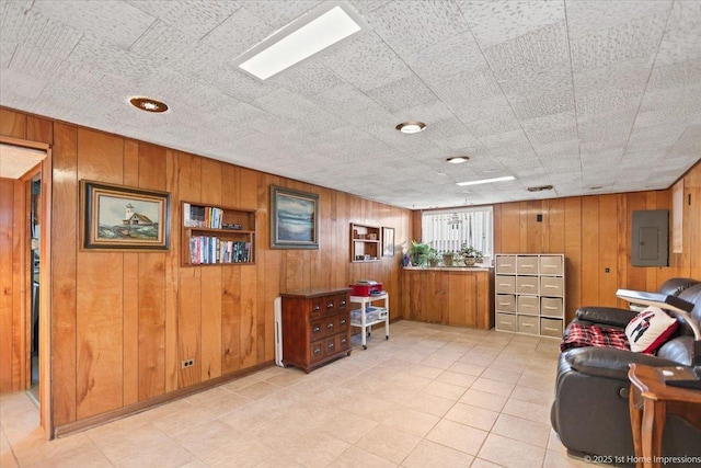 office with wood walls and electric panel