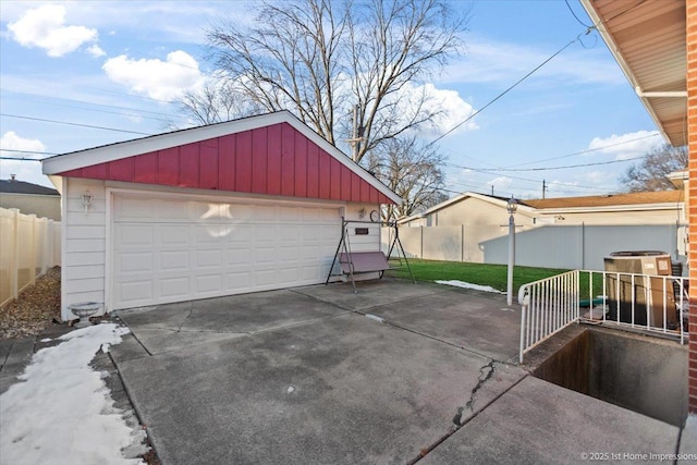 garage featuring a lawn