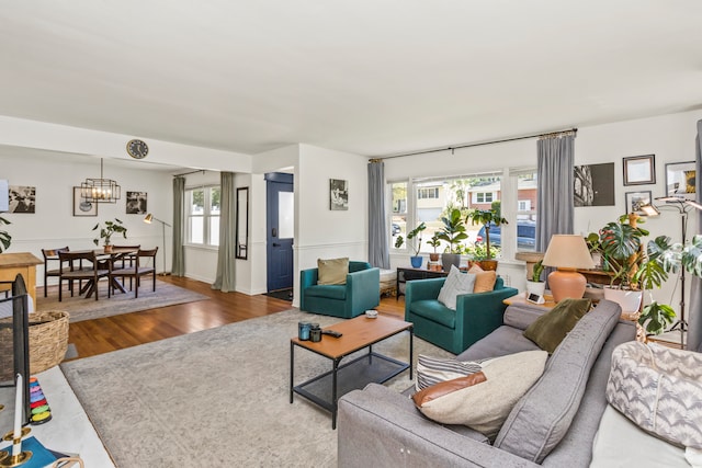 living room featuring a wealth of natural light and hardwood / wood-style floors