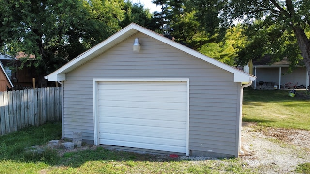 garage with a lawn