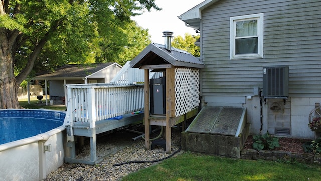 exterior space featuring central AC unit