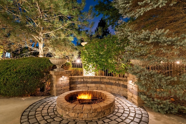 patio at twilight with a fire pit