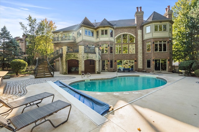 view of pool with a patio area