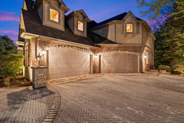 view of front of home with a garage