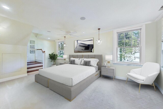 bedroom featuring recessed lighting, baseboards, light carpet, and multiple windows