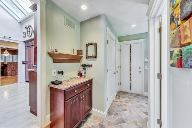 611 Elmwood Ave, Wilmette, IL 60091 - hall featuring baseboards and recessed lighting