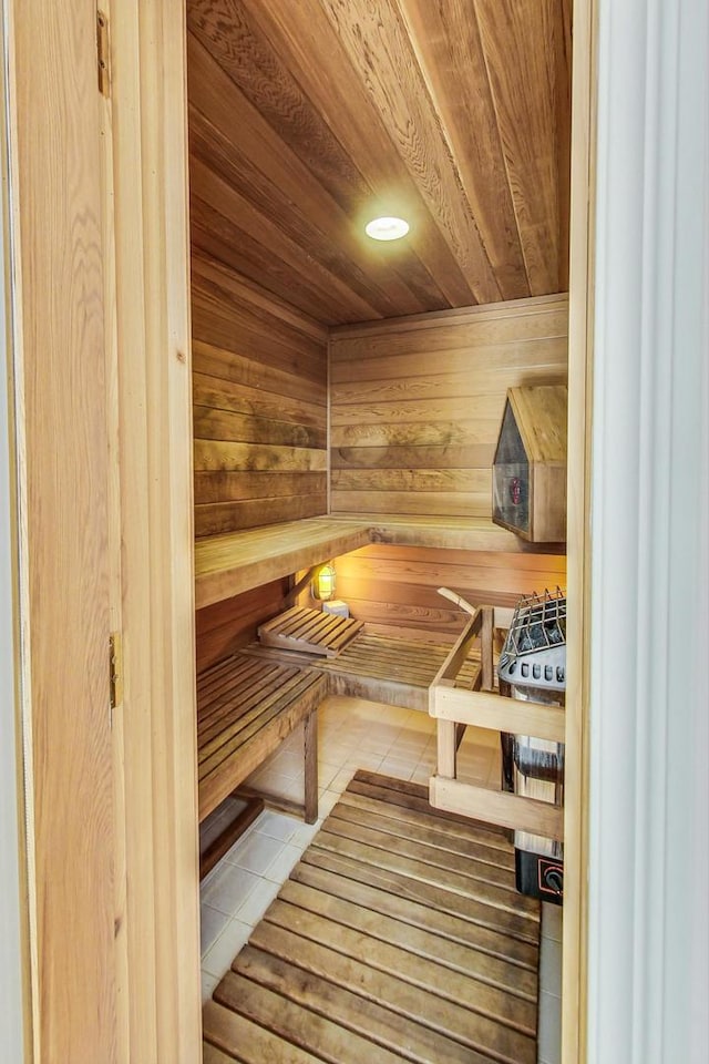 view of sauna featuring tile patterned floors