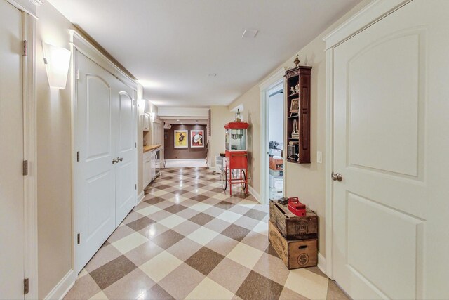 611 Elmwood Ave, Wilmette, IL 60091 - hallway featuring light floors and baseboards