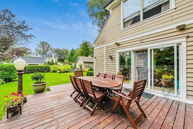 611 Elmwood Ave, Wilmette, IL 60091 - deck featuring a lawn and outdoor dining space