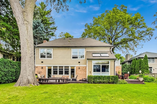 611 Elmwood Ave, Wilmette, IL 60091 - rear view of house featuring a patio, a chimney, and brick siding