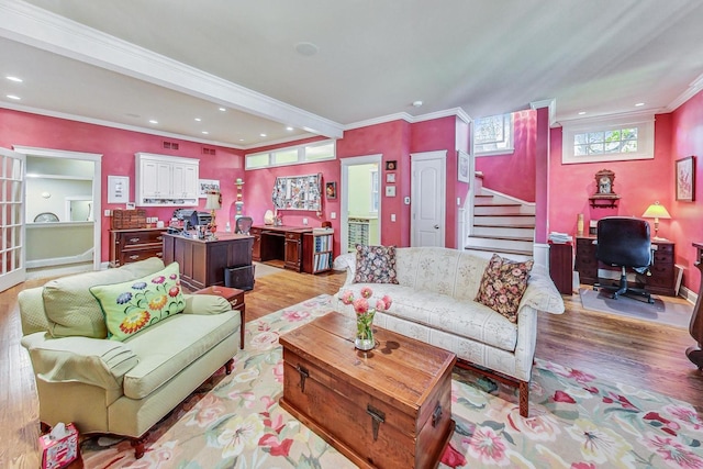 611 Elmwood Ave, Wilmette, IL 60091 - living room featuring light wood-type flooring, crown molding, a desk, stairs, and recessed lighting