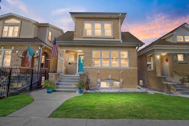 view of front of home featuring a yard